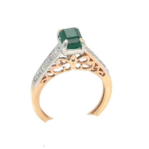 436 - An Emerald and Diamond Ring in Rose and White Gold.

Emerald Weight: Approximately 1ct
Stamped 14K 5... 