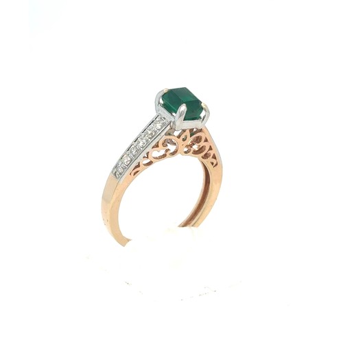 436 - An Emerald and Diamond Ring in Rose and White Gold.

Emerald Weight: Approximately 1ct
Stamped 14K 5... 