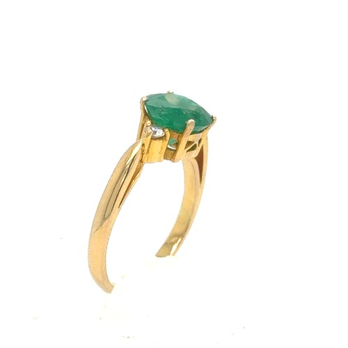 441 - An Emerald and Diamond Ring in Yellow 18K Gold.

Emerald Weight: Approximately 1.8ct
2.4g