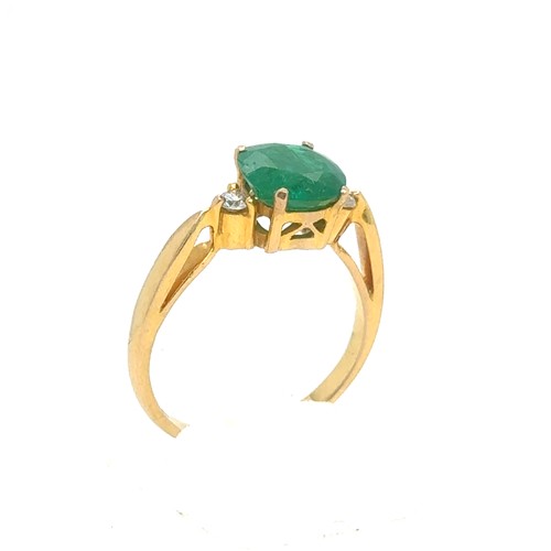 441 - An Emerald and Diamond Ring in Yellow 18K Gold.

Emerald Weight: Approximately 1.8ct
2.4g