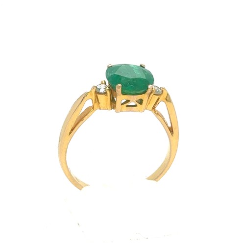 441 - An Emerald and Diamond Ring in Yellow 18K Gold.

Emerald Weight: Approximately 1.8ct
2.4g