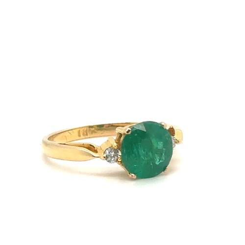 441 - An Emerald and Diamond Ring in Yellow 18K Gold.

Emerald Weight: Approximately 1.8ct
2.4g