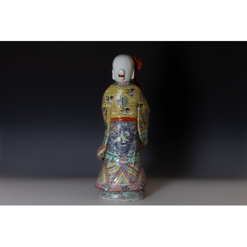 373 - A Chinese Large Famille Rose Enamel Porcelain Figure of a Man Holding a Stick.

H: Approximately 49c... 