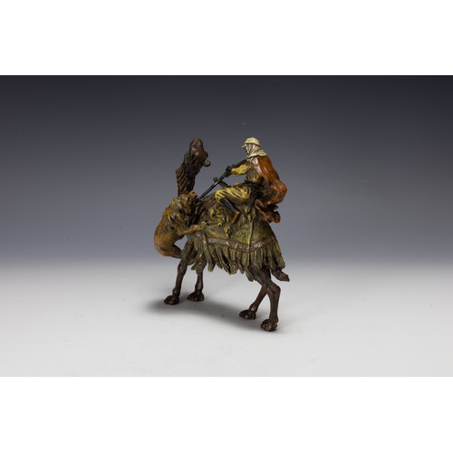 423 - An Austrian Bergman Bronze Figure of a Hunter on the Back of a Camel Attacking a Lion, Made for the ... 