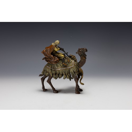 423 - An Austrian Bergman Bronze Figure of a Hunter on the Back of a Camel Attacking a Lion, Made for the ... 