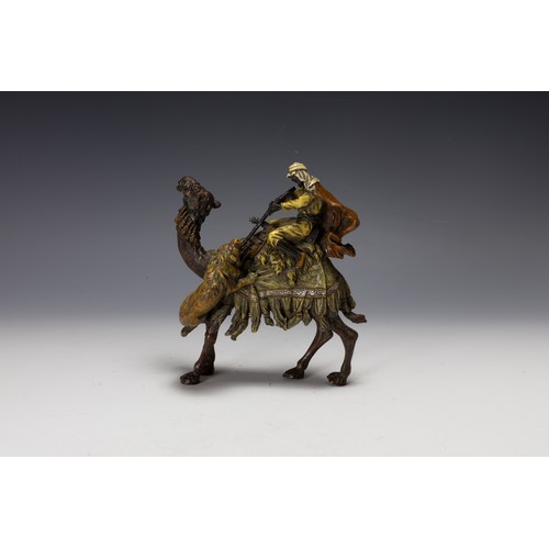 423 - An Austrian Bergman Bronze Figure of a Hunter on the Back of a Camel Attacking a Lion, Made for the ... 