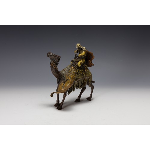 423 - An Austrian Bergman Bronze Figure of a Hunter on the Back of a Camel Attacking a Lion, Made for the ... 