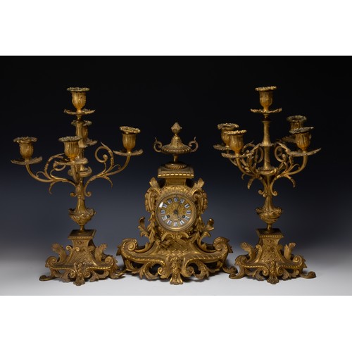 424 - A Lot of Continental Gilt Clock and 2 Candlesticks.

H of Candlesticks: Approximately 43.5cm
H of Cl... 