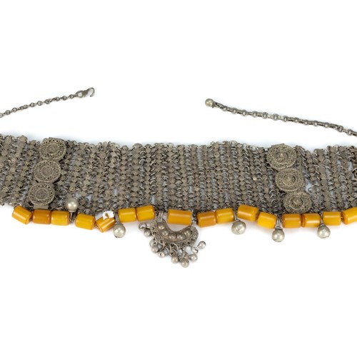 449 - A Tribal Yemeni White Metal Necklace with Amber Colour Beads.

179g