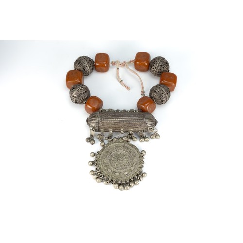 450 - A Large Tribal Yemeni White Metal Necklace with Amber Colour Beads.

569g