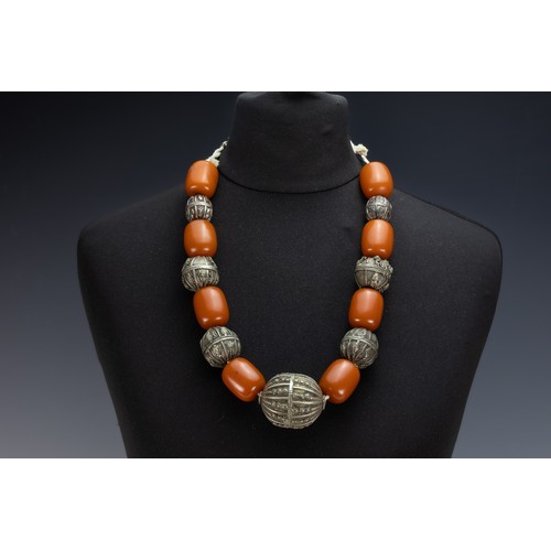 458 - A Tribal Yemeni White Metal and Amber Colour Beads Necklace. 

173g