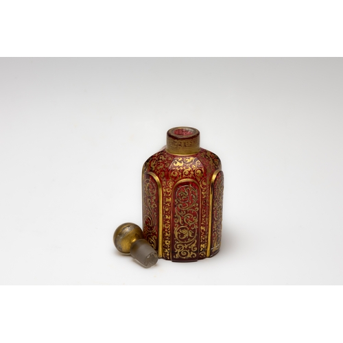 41 - An Antique Bohemian Red Gilted Scent Bottle Depicting Floral Patterns from the 19th Century.

H: App... 