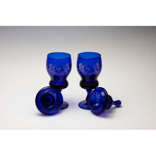 49 - A Pair of Antique Bohemian Blue Goblets Depicting Angels with Bows & Arrows from the 19th Century.