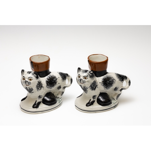 83 - A Pair of Vintage Continental Porcelain Figures of Staffordshire Cats.

H: Approximately 12cm