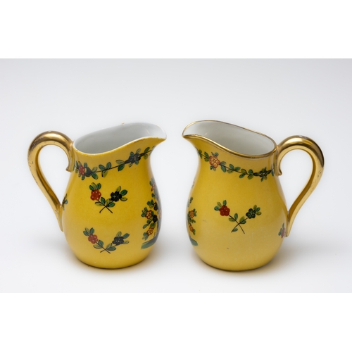 85 - A Pair of Vintage Dresden Yellow Porcelain Milk Pots Depicting Floral Patterns from Circa 1900s.

H:... 