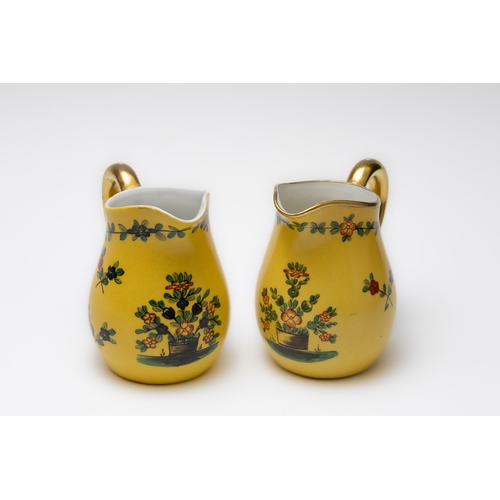 85 - A Pair of Vintage Dresden Yellow Porcelain Milk Pots Depicting Floral Patterns from Circa 1900s.

H:... 