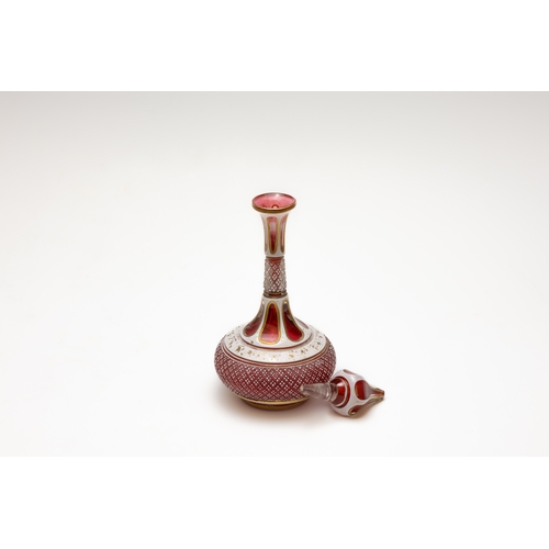 89 - An Antique Bohemian Red Overlay Glass Cologne Bottle from the 19th Century.

H: Approximately 19.5cm