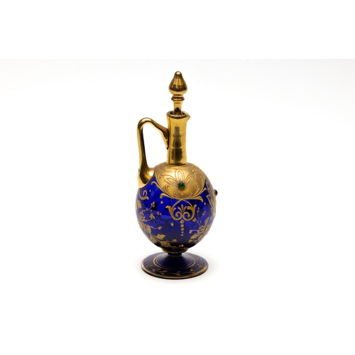 96 - A Vintage Bohemian Blue Glass Decanter from the Early 20th Century.

H: Approximately 21cm