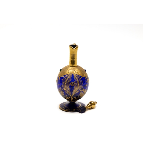 96 - A Vintage Bohemian Blue Glass Decanter from the Early 20th Century.

H: Approximately 21cm