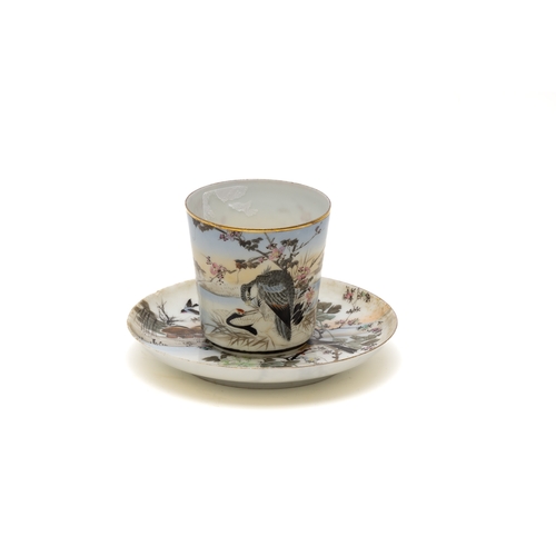 97 - A Japanese Porcelain Cup with Saucer Depicting a Bird on a Tree from the 19th Century with Character... 