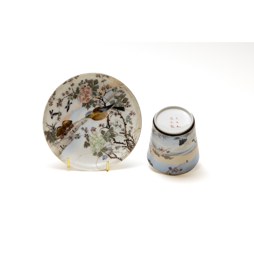 97 - A Japanese Porcelain Cup with Saucer Depicting a Bird on a Tree from the 19th Century with Character... 