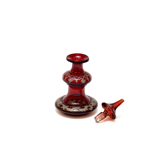 102 - An Antique Bohemian Ruby Glass & Enamel Perfume Bottle from the 19th Century

H: Approximately 16cm