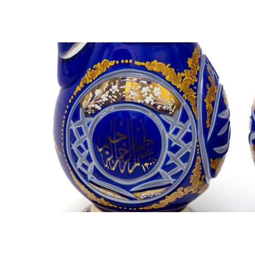 156 - A Pair of Large Bohemian Blue Glass Jugs Made for the Islamic Market.

H: Approximately 33cm