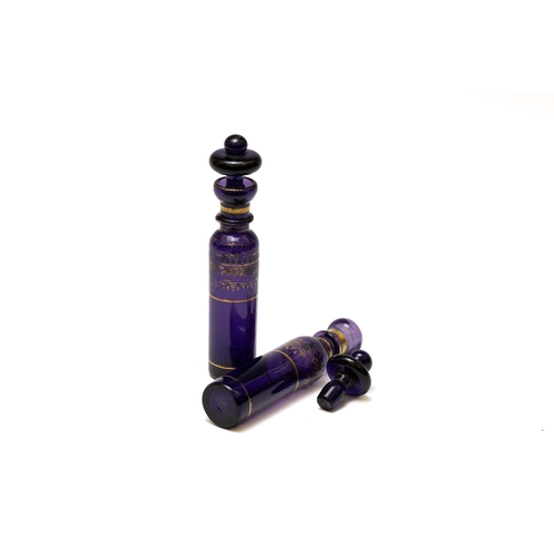 107 - A Pair of French Purple Glass Perfume Bottle from the 19th Century.

H: Approximately 18cm