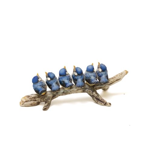 108 - A Vintage English Porcelain Figure of 6 Blue Birds on a Branch.

Approximately 21x8cm