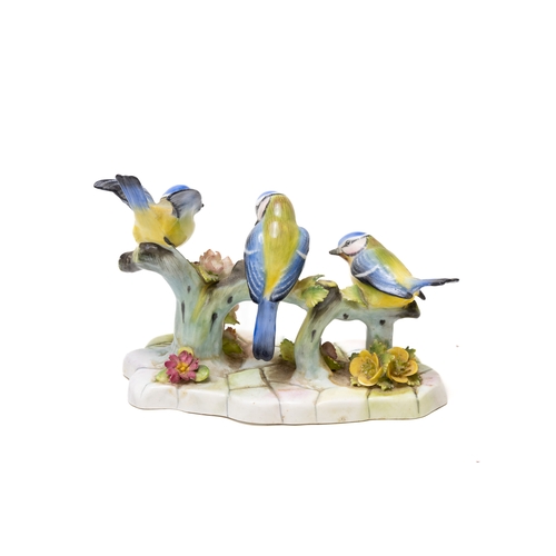 109 - A Vintage English Porcelain Figure of 3 Birds on a Branch with Flowers.

Approximately 16x12cm