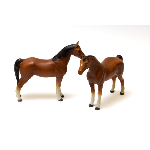 116 - A Pair of Vintage Continental Porcelain Figures of Horses.

Approximately 17x19.5cm