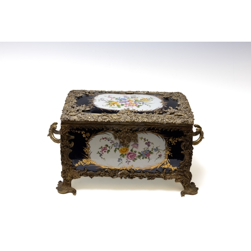 117 - An Antique Continental Porcelain & Bronze Box.

Approximately 30x19cm