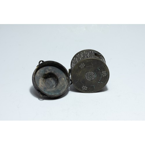 288 - An Islamic Khorasan Bronze Inkwell with Silver Inlay from the 13th Century.

H: Approximately 10cm
D... 