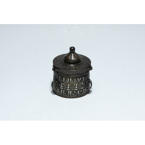 288 - An Islamic Khorasan Bronze Inkwell with Silver Inlay from the 13th Century.

H: Approximately 10cm
D... 