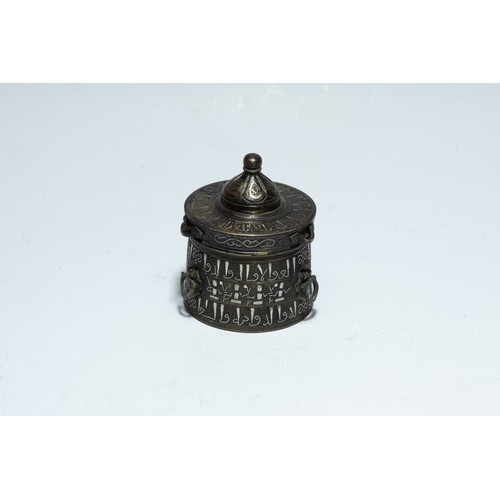 288 - An Islamic Khorasan Bronze Inkwell with Silver Inlay from the 13th Century.

H: Approximately 10cm
D... 