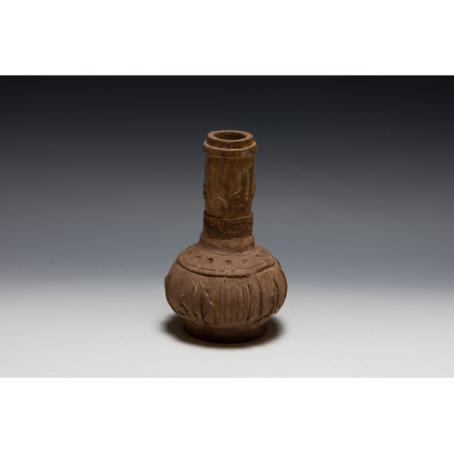 290 - An Islamic Mamluk Carved Wooden Vase.

H: Approximately 18cm