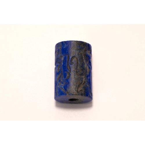 221 - A Lapiz Lazuli Cylindrical Seal in the Style of the Awwadian Period.

L: Approximately 2.8cm