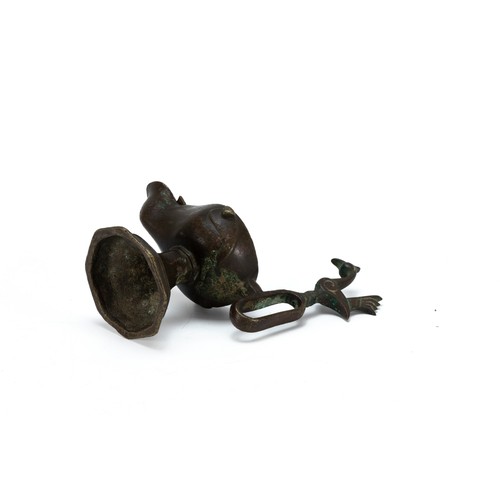 293 - An Islamic Bronze Oil Lamp from the 12th Century.

H: Approximately 15cm