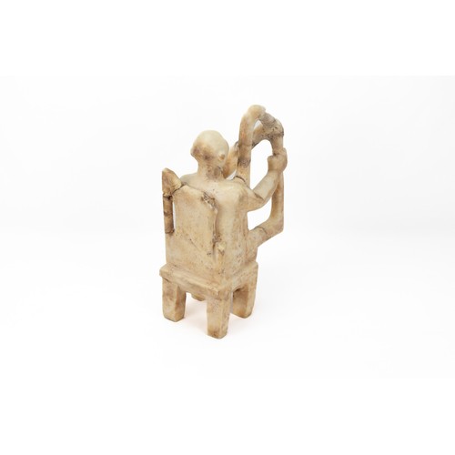 229 - A White Marble Seated Musician in the Style of the 3rd Millennium B.C of the Cyclonic Period.

H: Ap... 