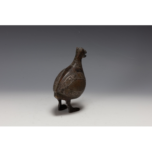 296 - An Islamic Bronze Incense Burner in the Shape of an Incense Burner from the 12th Century with Islami... 