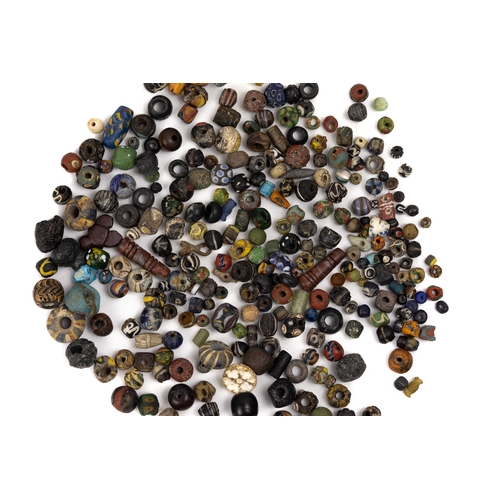 252 - A Collection of Islamic and Roman Beads.