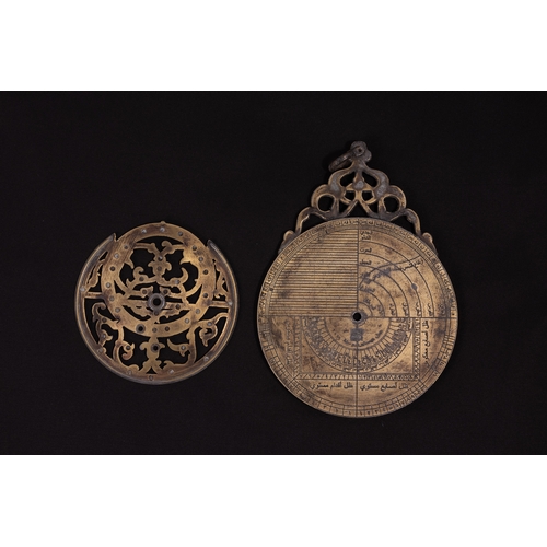 302 - An Islamic Brass Planispheric Astrolabe.

L: Approximately 16.5cm