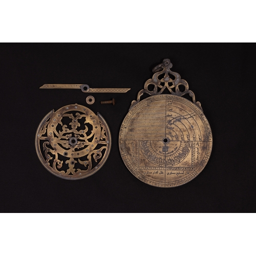 302 - An Islamic Brass Planispheric Astrolabe.

L: Approximately 16.5cm