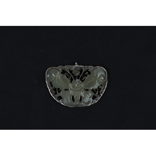 383 - A Chinese Jade & Silver Pendant in the Shape of a Butterfly.

Approximately 6.3x4.5cm