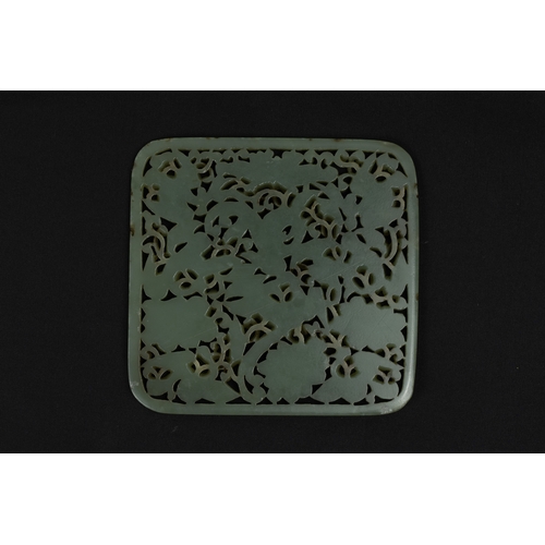 386 - A Rare Large Chinese Jade Plaque Depicting Floral Patterns & Birds.

Approximately 13x13cm