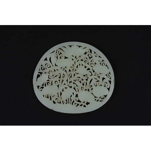 387 - A Rare Large Chinese White Jade Circular Plaque Depicting Floral Patterns & Birds.

Approximately 10... 