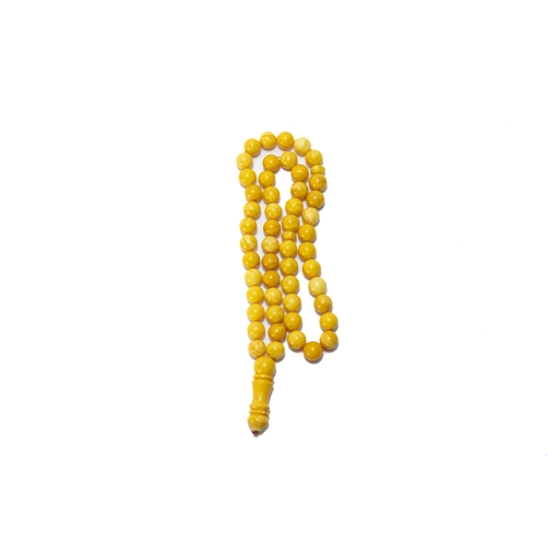 325 - An Islamic Butterscotch Amber Prayer Beads.

61g