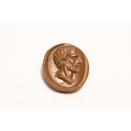 209 - An Ancient Roman Red Agate Circular Stone Depicting Emperor Julius Caesar's Head.

L: Approximately ... 