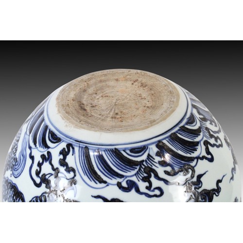 73 - A Chinese Blue & White Flower Pot from the 20th Century with a Dragon Design and Chinese Writing

He... 