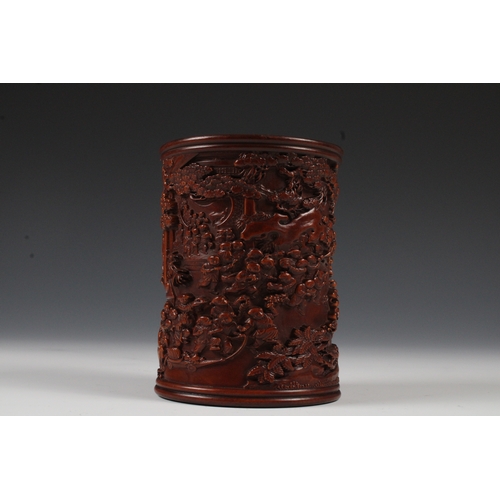 77 - A Chinese Wooden Brush Pot with Decoration of Trees and People. 

Height: Approximately 12cm
Length:... 